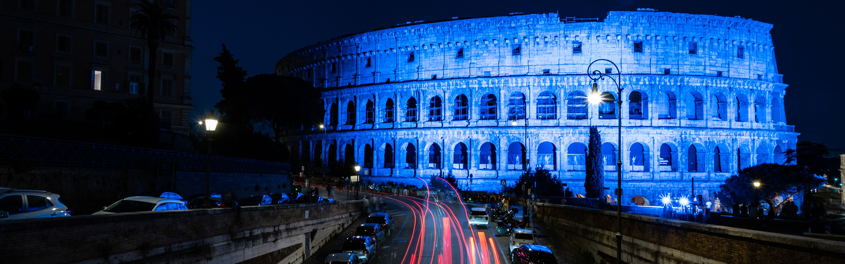 Acea's governance system Colosseum illuminated in blue in the evening