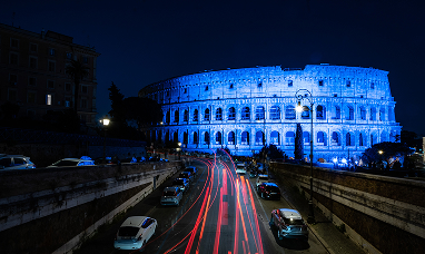 Acea's governance system Colosseum illuminated in blue in the evening