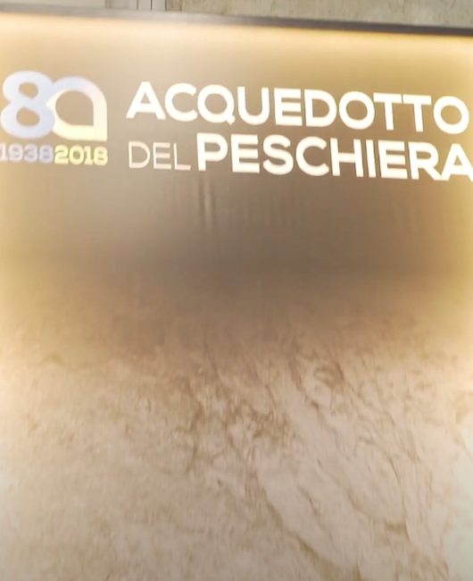 Event poster for the 80th anniversary of the peschiera aqueduct