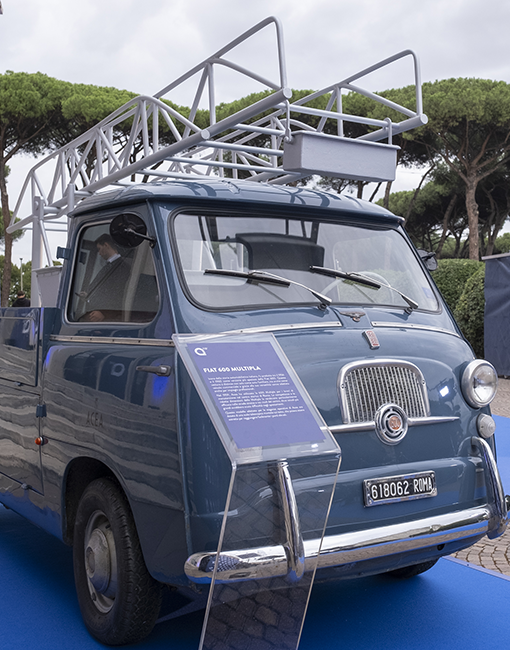 A Fiat 500 modified to house a ladder on display