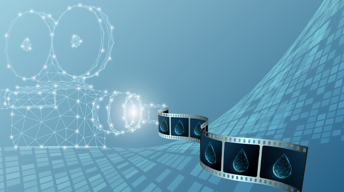 Stylized camera from which a negative emerges showing some drops