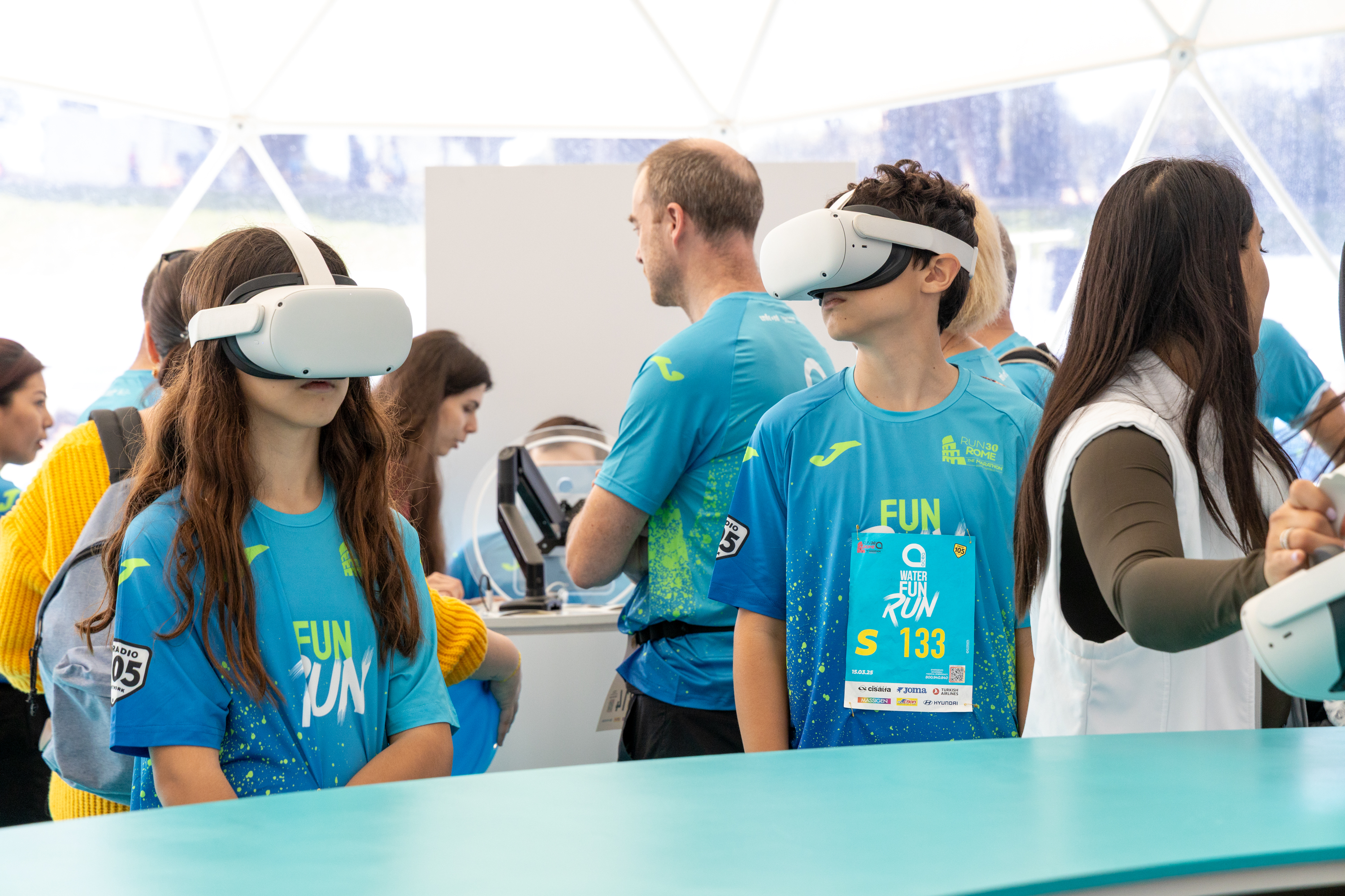 Young participants wearing VR headsets