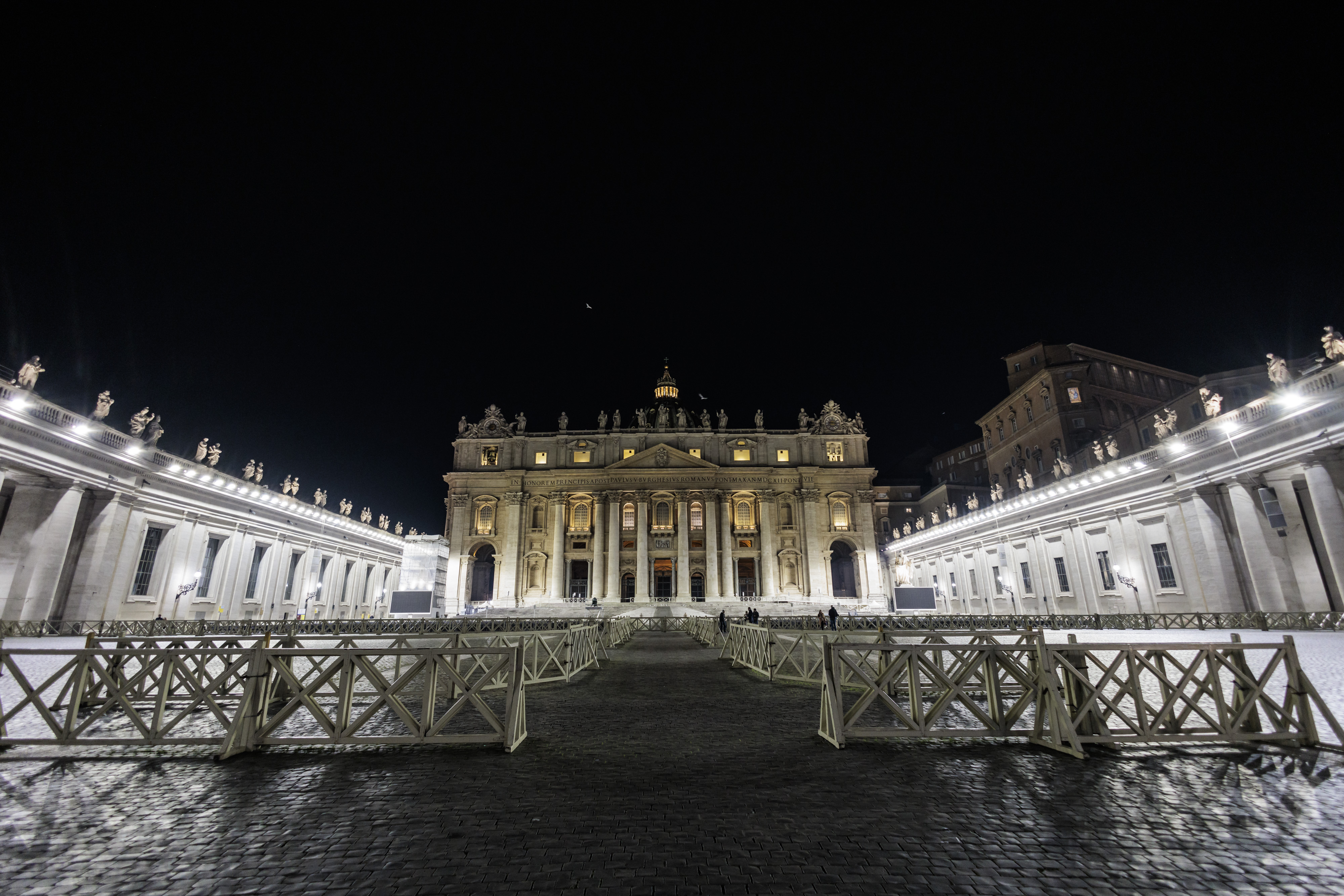 Illuminated entrance to St Peter's Basilica